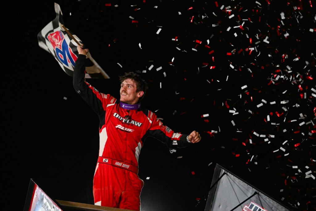 Hank Davis celebrates in victory lane