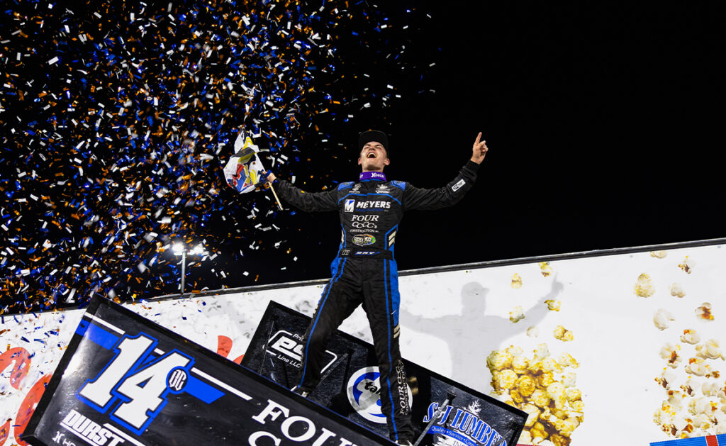 Cory Day atop his car - photo by Trent Gower
